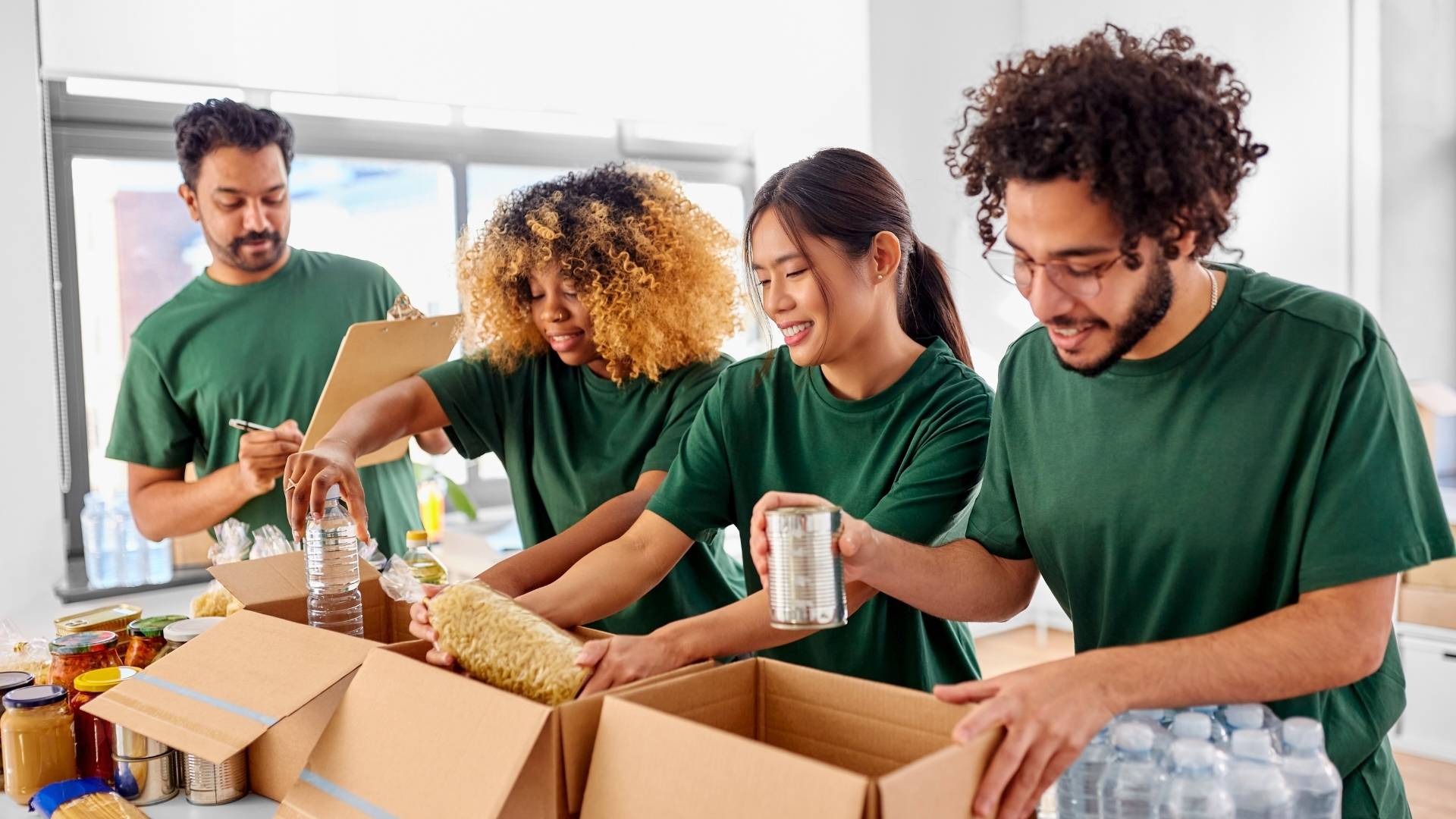 christian outreach in michigan food pantry packing donation boxes people helping for a greater cause leadership