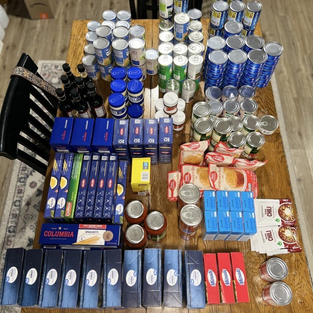 boxed food and canned food lined up on the floor